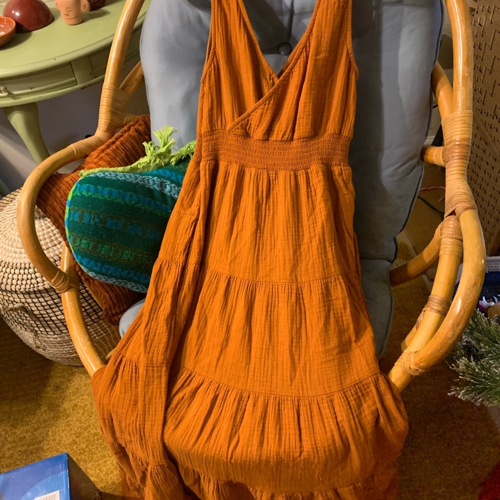 layered tiered dress with pockets in a beautiful rust color!